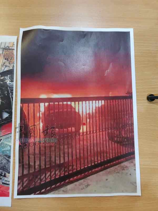 黄女士的住家被大耳窿跑腿抛掷汽油弹。
