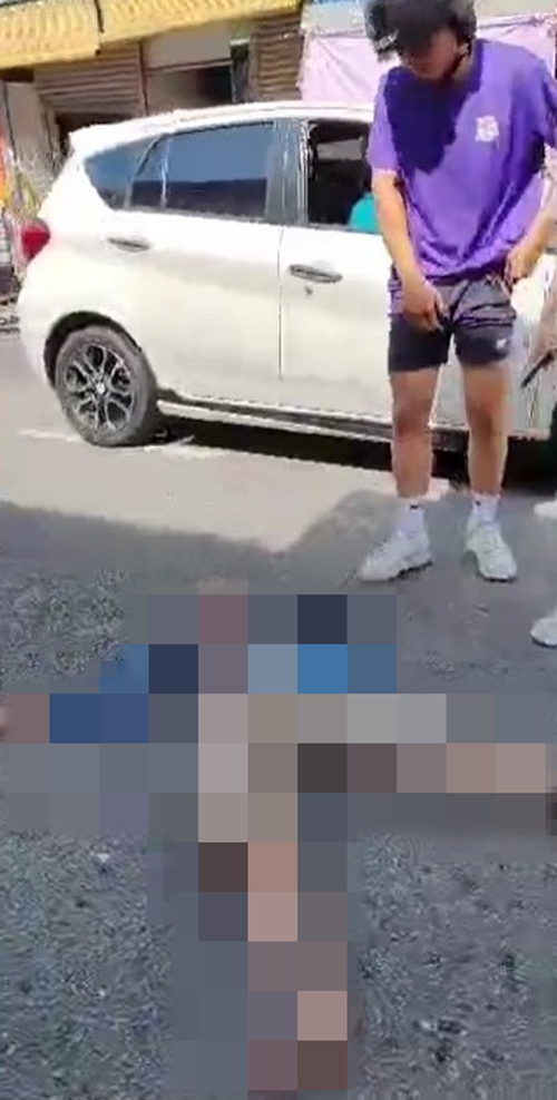 华裔老妇步行过马路时被撞倒，惨遭17岁年轻骑士（右）撞毙。