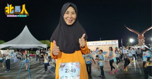 单肾阿嬷跑半马拉松 65岁拉哈雅征服21公里
