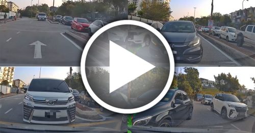 塞车也不能乱来 司机狂鸣笛 逼退逆行者