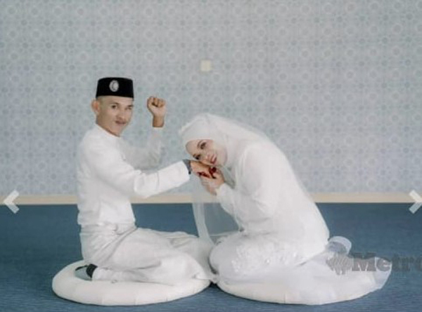 51岁单亲妈妈艾丽雅苏迪曼(左起)嫁给年仅28岁的视障青年莫哈末艾札艾曼。