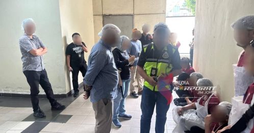 移民局突击新山医药中心 34外劳与2主管被扣