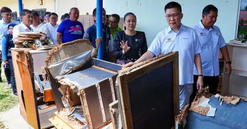 沙巴水灾土崩｜黄家和视察6学校 提供援助改善方案