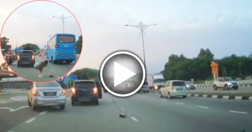 女司机大道急停捡鞋 网民：怎么掉的？