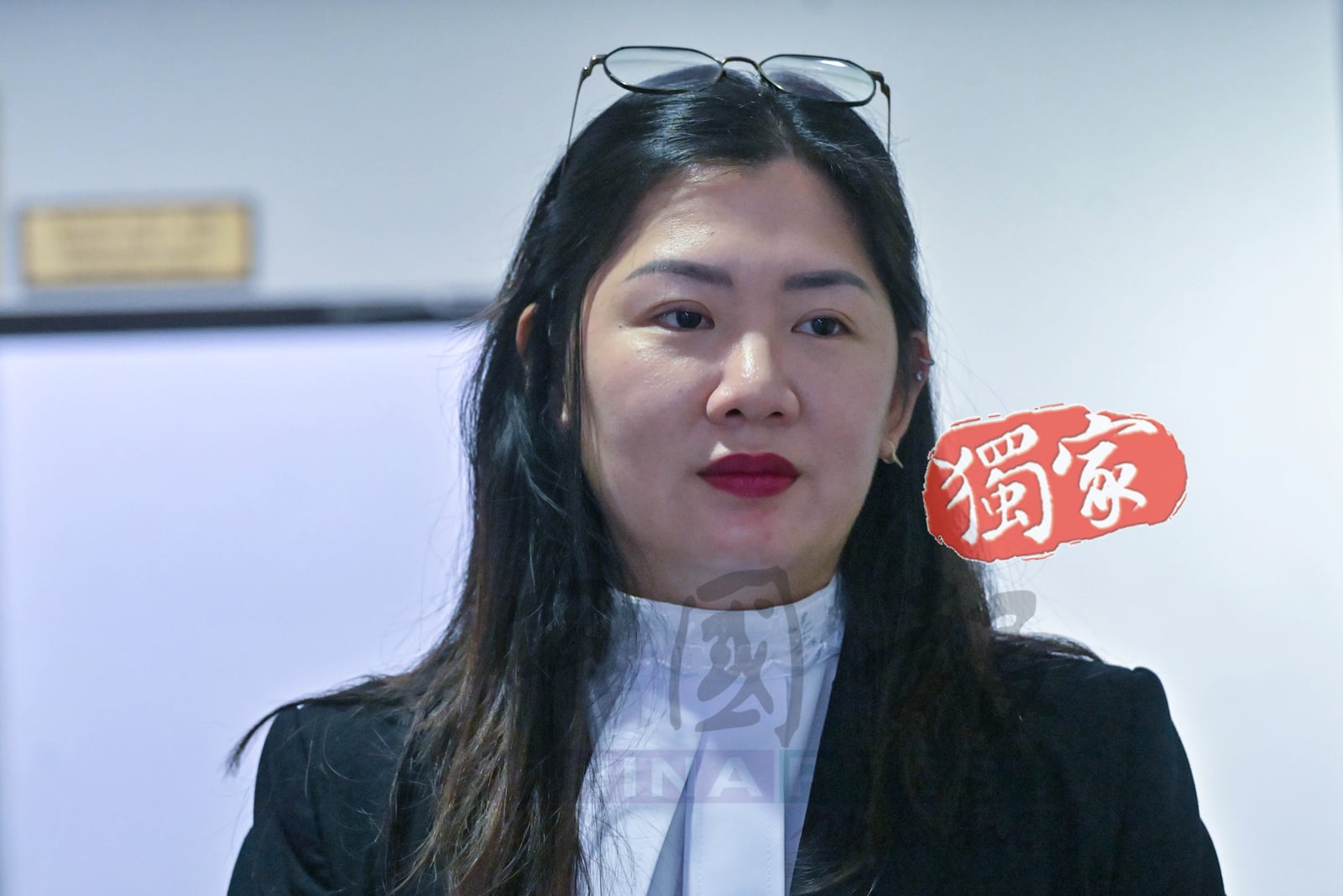 郑子媚是受法庭委任担任被告的代表律师。